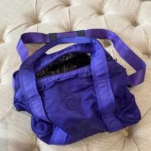 IVIVA small purple duffle bag